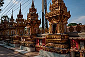 Vientiane, Laos - Pha That Luang, Other structures on the ground include a bell tower, several stupas, a number of pavilions sheltering images of the Buddha.  